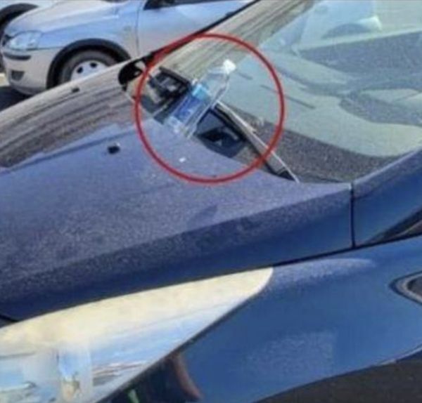 If you see a plastic water bottle on your car hood, here’s the creepy thing it might mean