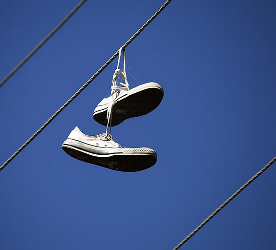 The Meaning Behind Shoes Strung Up On A Power Line