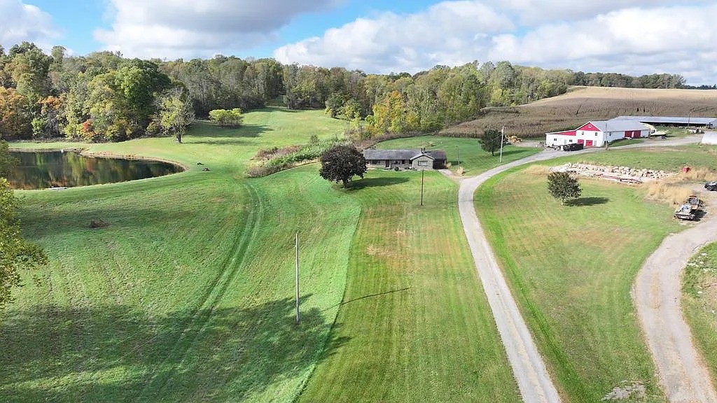 130-Acre Farm with Historic House, Pond, and Outbuildings