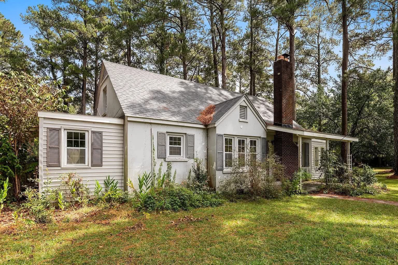 Charming Aurora Property with Land, Garage, and Renovation Potential