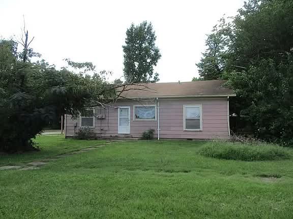 Handyman’s Dream — Big Lot, Big Garage, and Big Potential