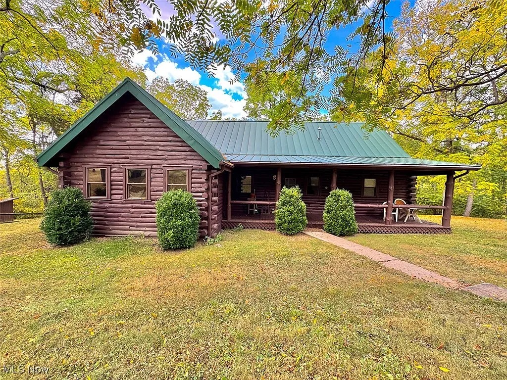 63-Acre Property with Lodge, Pond, and Hunting