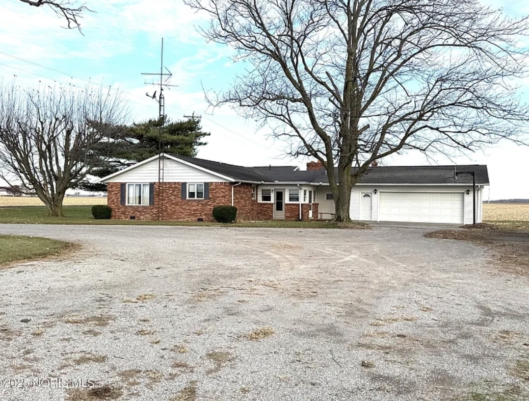 Spacious Brick Ranch Home with Multiple Outbuildings