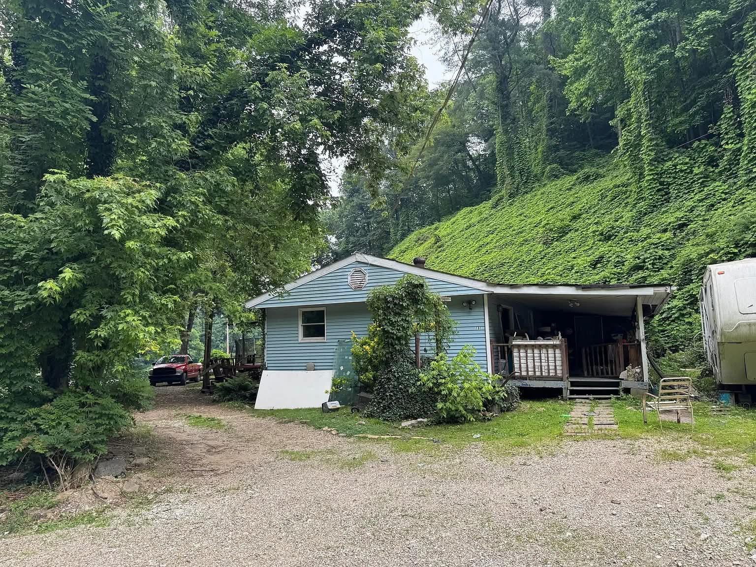 Cozy Home with a Pond on 133 Acres. $185,000