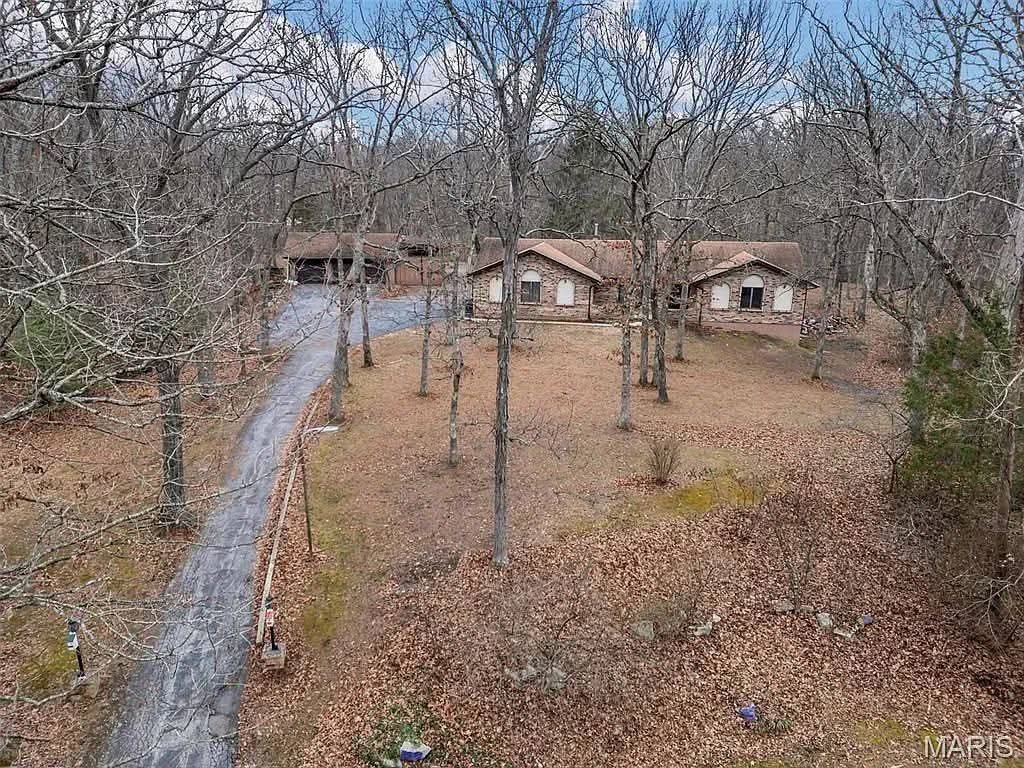 Private 3+ Acre Spanish-Inspired Ranch with Multigenerational Living & Extensive Outbuildings