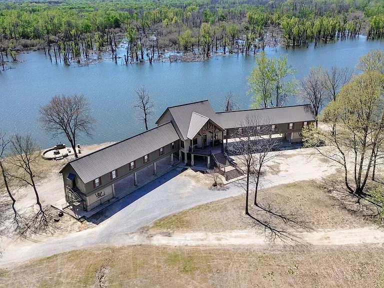 Massive 1,750-Acre Outdoor Retreat with 22 Bedrooms, River Access and Premier Hunting Lodge