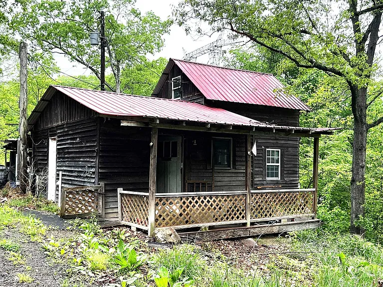 Hunting Cabin Retreat with Loft Bedroom, Private Setting & Renovation Potential