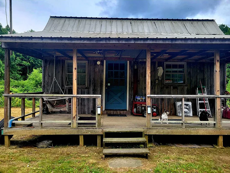 Secluded 64-Acre Cabin Retreat with Stocked Ponds, Forest Land and Endless Outdoor Potential