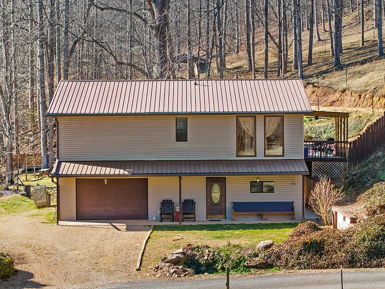 5-Acre Creekside Retreat with Finished Walk-Out Basement, Scenic Deck & Wooded Hillside Views