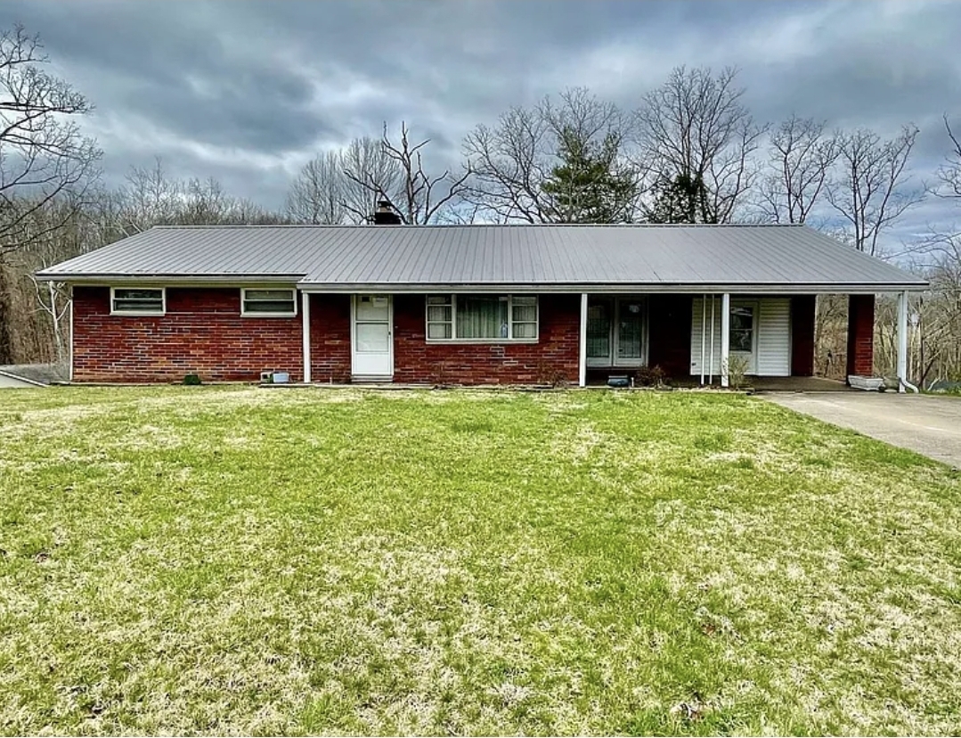 Spacious Brick Ranch Home with Multiple Living Areas and Wooded Privacy