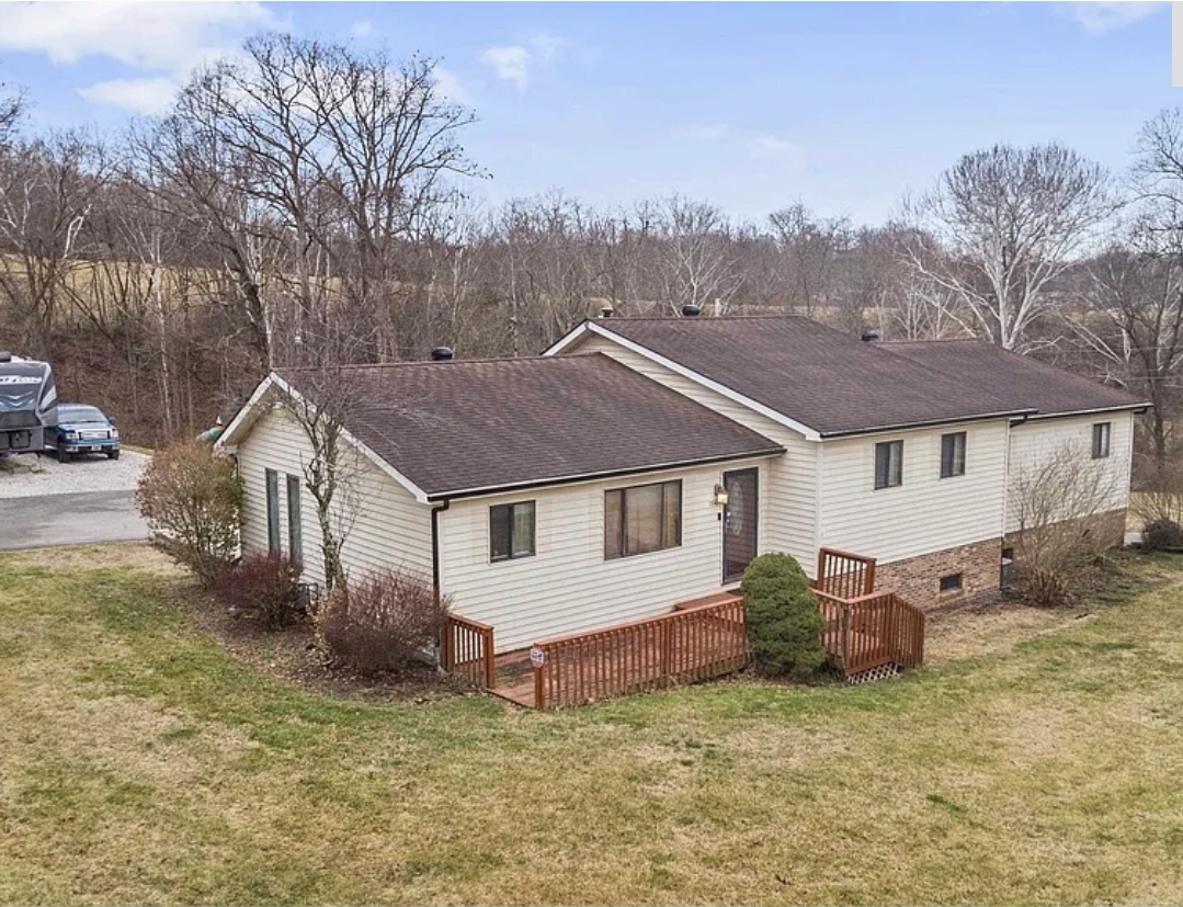 Spacious Ranch Home with Finished Basement, Multiple Garages, and Exceptional Outdoor Living