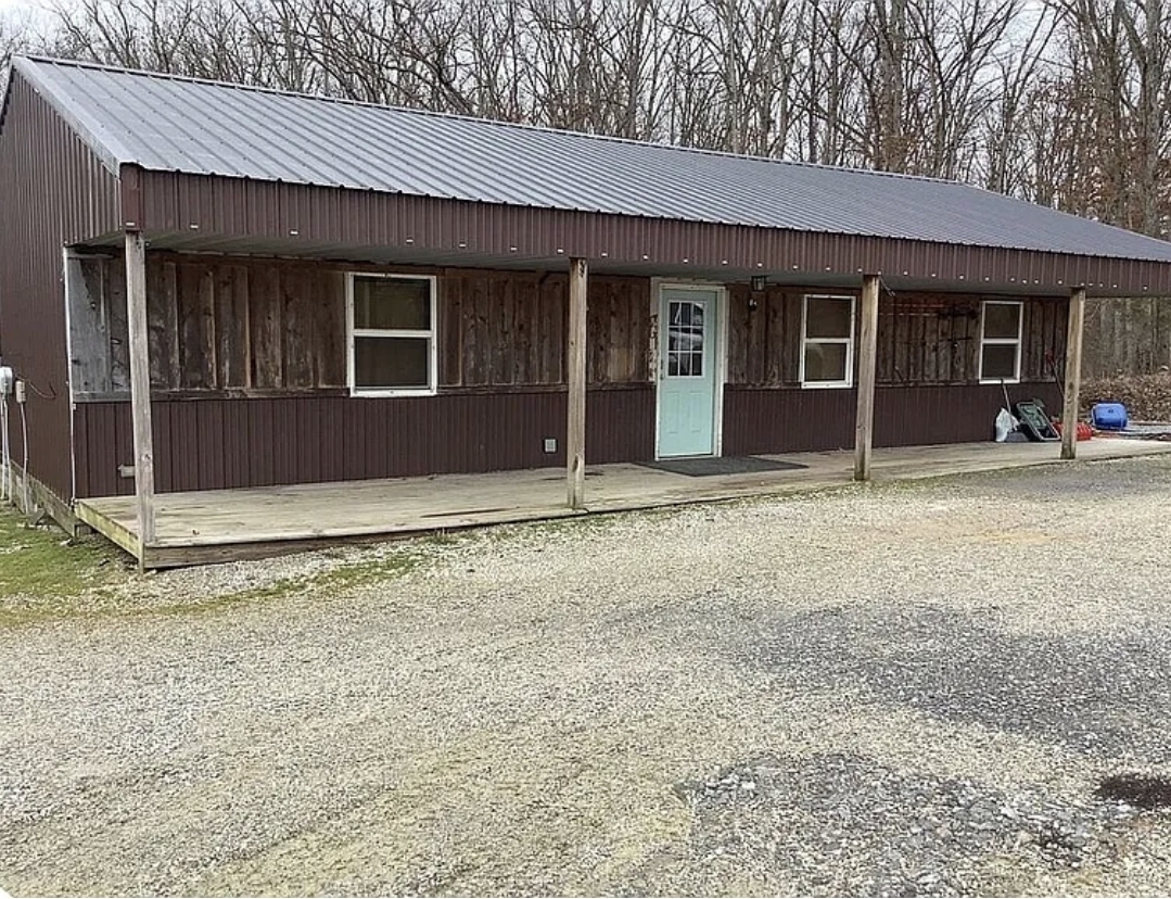 Private Multi-Home Retreat on 15 Acres with Pond Views and Income Potential