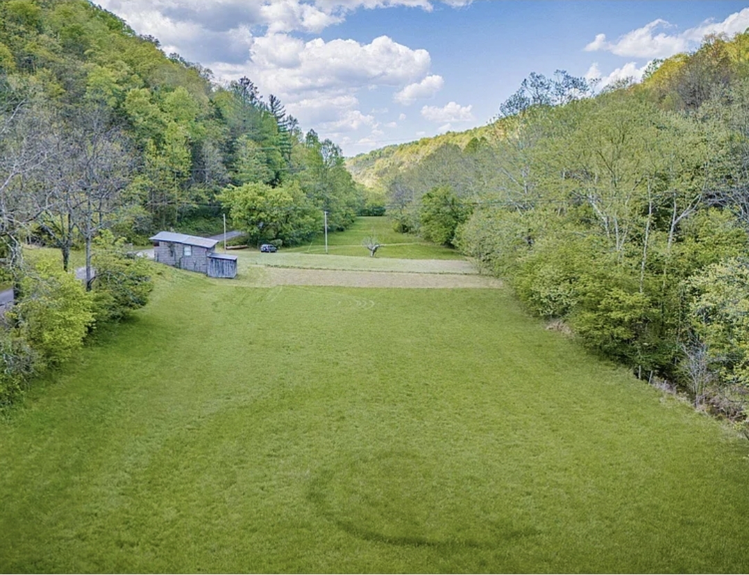 Expansive Mountain Acreage with Creek, Open Pasture, and Endless Possibilities