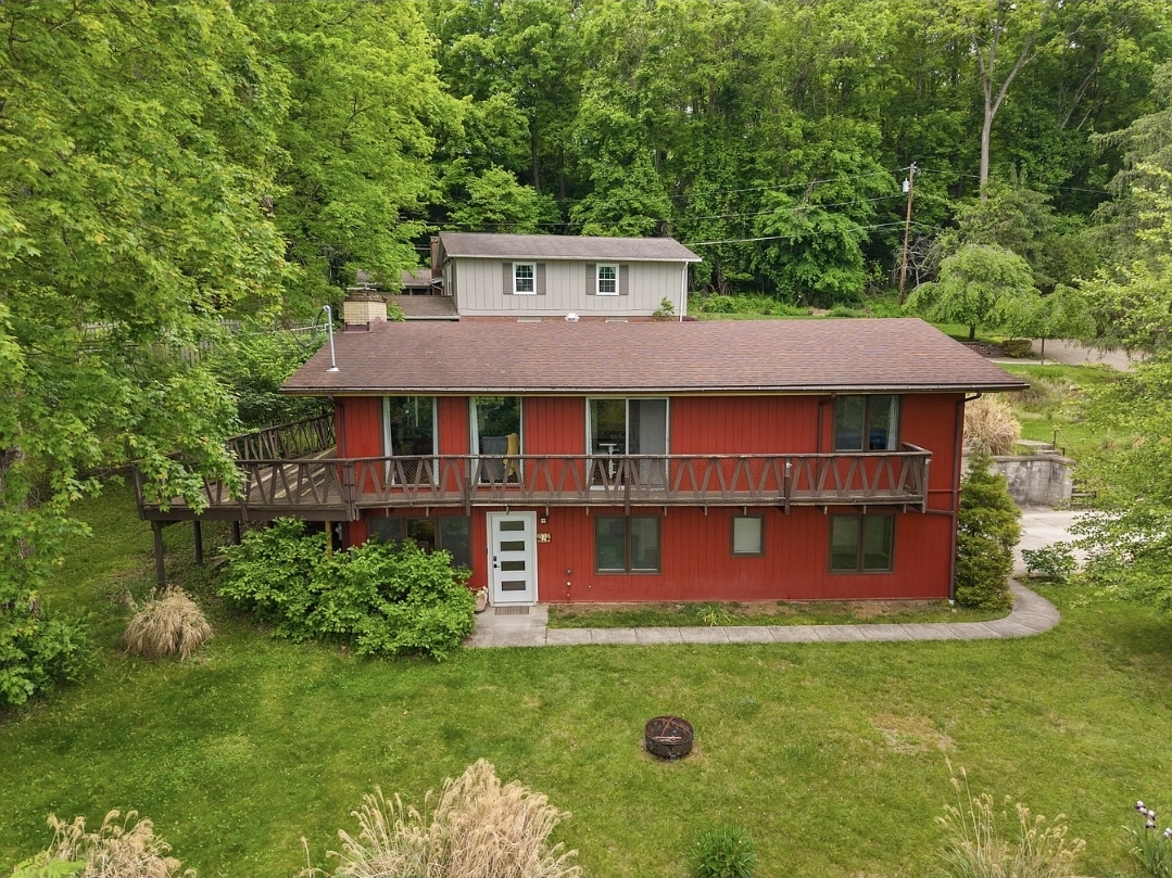 Beautifully Renovated Ranch Home with Wooded Privacy, Dual Fireplaces, and Walkout Lower Level