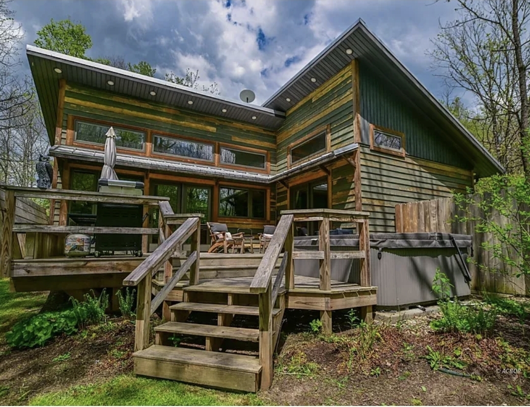 Contemporary Retreat Home with Hot Tub, Wooded Views, and Turnkey Rental Potential
