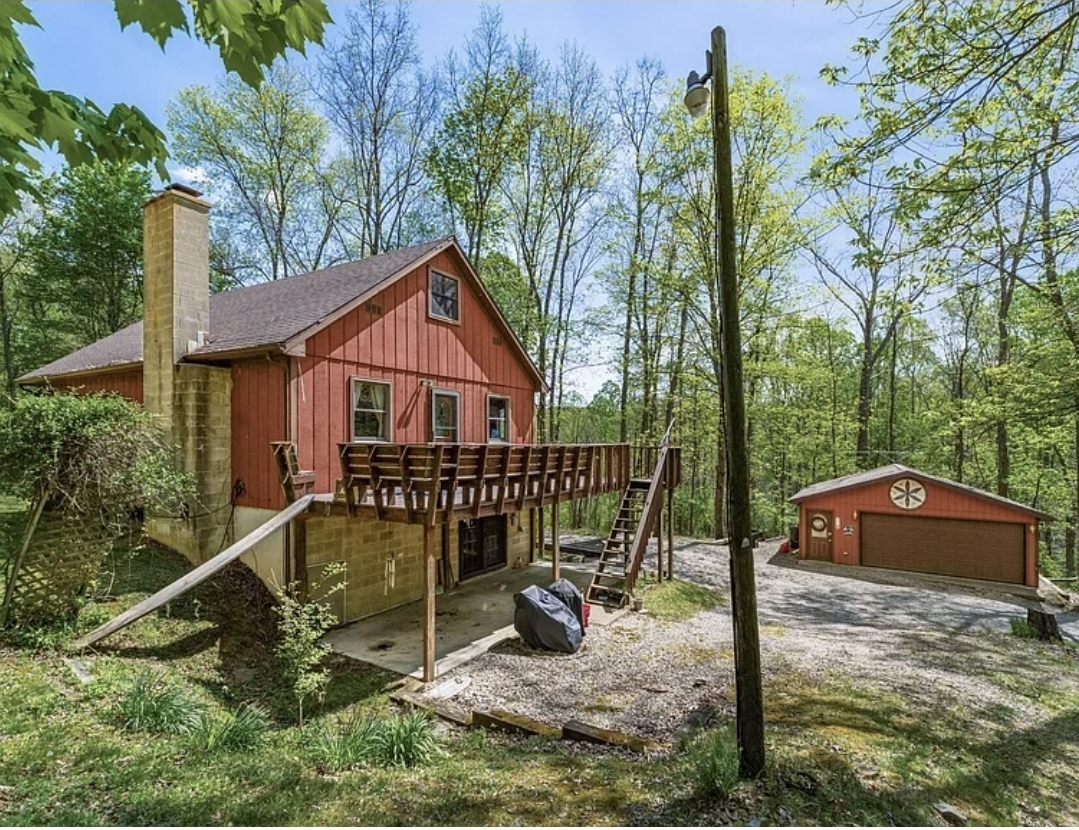 Private Woodland Retreat with Wraparound Porch, Finished Walk-Out Level, and Expansion Potential