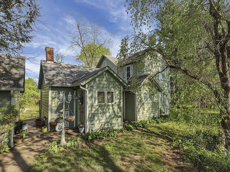 Charming Farmhouse with Barn, Gardens, and Countryside Living