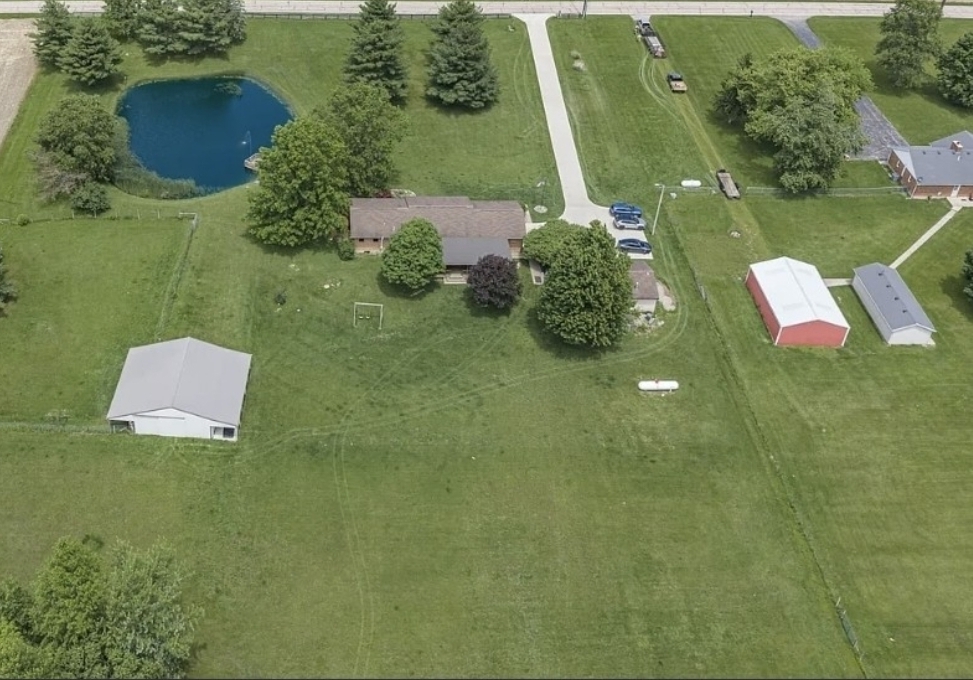 Private Pond Estate with Updated Ranch Home, Entertaining Barn, and Exceptional Outdoor Living