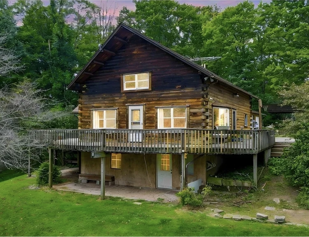 3 Bedroom, 2 Bathroom Log Cabin with Multiple Garages and Wooded Views