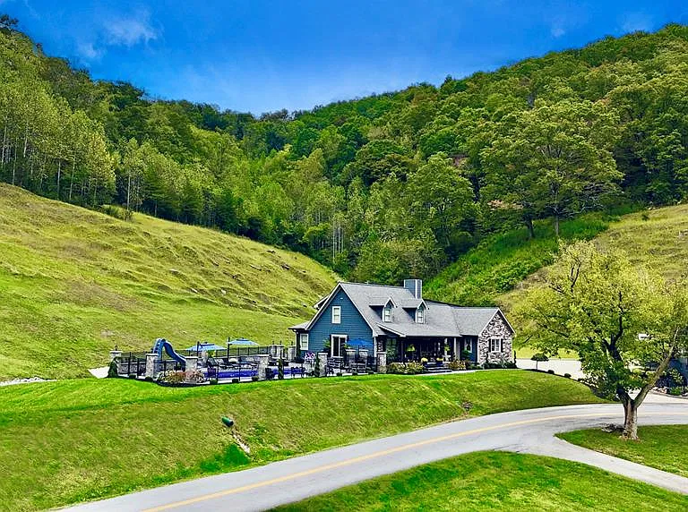 45 Acres Featuring Two Homes, a Pool, Barn, and Breathtaking Views